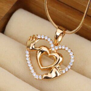 "Rose Gold Baby Heart Pendant with Tiny Hands and Feet Design, XPPT1244